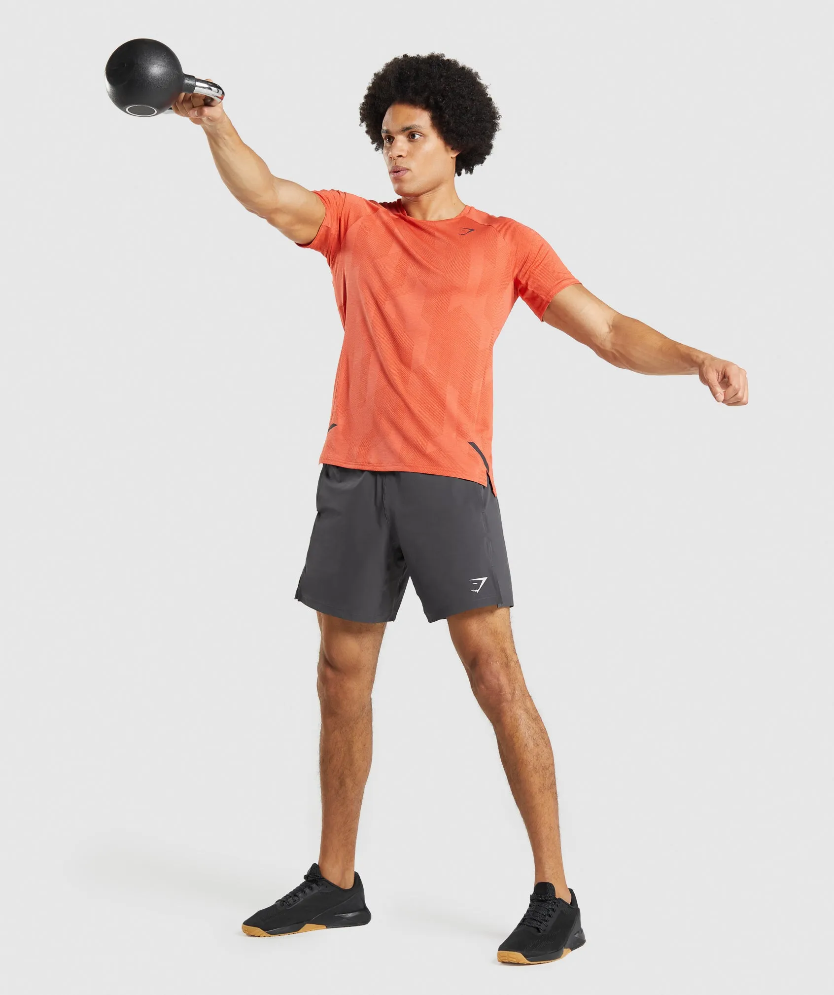 High-Performance Gymshark Apex T-Shirt in Vibrant Spicy Orange and Papaya Orange Colors