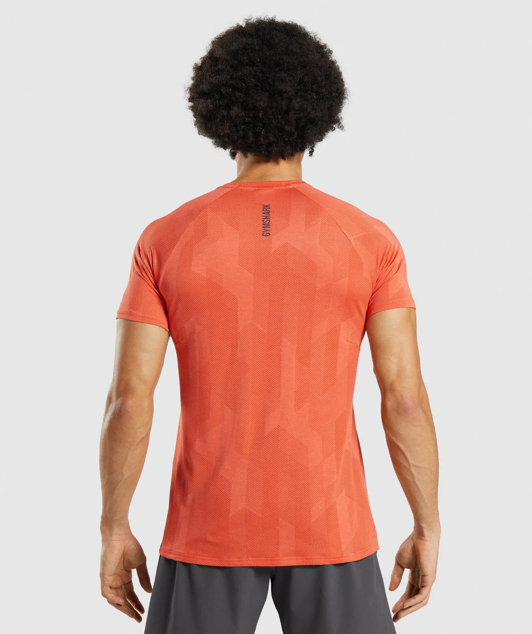 High-Performance Gymshark Apex T-Shirt in Vibrant Spicy Orange and Papaya Orange Colors